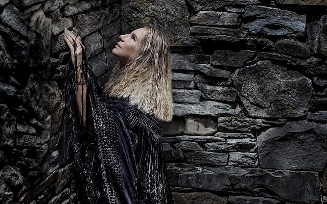 This cover image released by Columbia Records shows 'Walls' a new album by Barbra Streisand. (Russell James/Columbia Records via AP) This cover image released by Columbia Records shows 'Walls' a new album by Barbra Streisand. (Russell James/Columbia Records via AP)