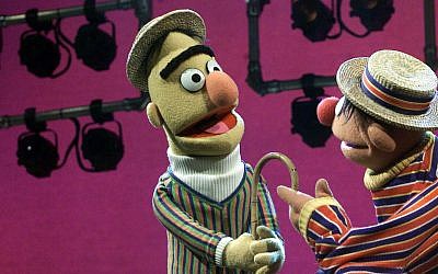 Long time pals Bert, left, and Ernie argue with each other as always on August 22, 2001, during an interview in New York (AP Photo/Beth A. Keiser)