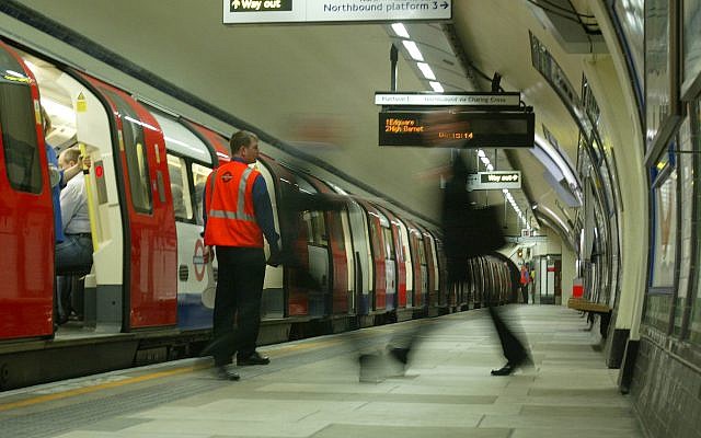 Illustrative: Rush hour passenger walks along an empty platform at Kennington Tube Station in London, Friday, July 8, 2005 (AP Photo/Sergio Dionisio) Illustrative: Rush hour passenger walks along an empty platform at Kennington Tube Station in London, Friday, July 8, 2005 (AP Photo/Sergio Dionisio)