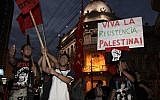 Demonstrators shout slogans against Israel's military strikes on the Gaza Strip during a protest in Asuncion, Paraguay, Friday, January 9, 2009. (AP/Rene Gonzalez)