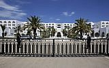 Guards stand in the Tunisian hotel where foreign tourists were massacred in 2015, as it reopens Tuesday May 2, 2017 in Sousse.  (AP Photo/Sami Boukef)