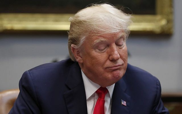US President Donald Trump pauses before speaking during a discussion for drug-free communities support programs, in the Roosevelt Room of the White House, Wednesday, Aug. 29, 2018, in Washington (AP Photo/Alex Brandon)