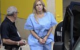 In this September 24, 2015 photo, Aurea Vazquez Rijos, who was accused more than a decade ago of the murder of her husband, the Canadian Adam Anhang, is taken to the Federal Court in Hato Rey, Puerto Rico (Carlos Giusti/El Vocero via AP)