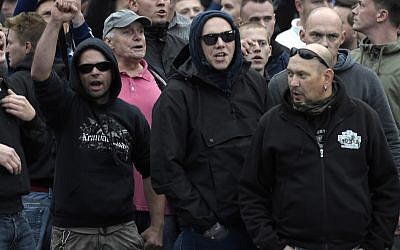 Illustrative image of far-right demonstrators shouting during a demonstration in Chemnitz, eastern Germany, September 1, 2018. (Jens Meyer/AP)