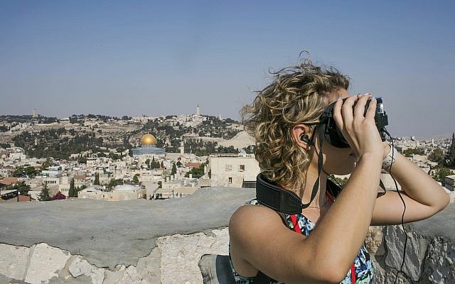 In this Monday, Sept. 3, 2018 photo, released by the Tower of David Museum, a visitor uses goggles on a new virtual reality tour that allows visitors to experience how archaeologists believe Jerusalem looked 2,000 years ago (Tomer Zmora/Tower of David Museum via AP) In this Monday, Sept. 3, 2018 photo, released by the Tower of David Museum, a visitor uses goggles on a new virtual reality tour that allows visitors to experience how archaeologists believe Jerusalem looked 2,000 years ago (Tomer Zmora/Tower of David Museum via AP)