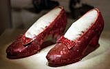 This April 10, 1996, file photo shows one of the four pairs of ruby slippers worn by Judy Garland in the 1939 film 'The Wizard of Oz' on display during a media tour of the 'America's Smithsonian' traveling exhibition in Kansas City, Missouri (AP Photo/Ed Zurga, File)