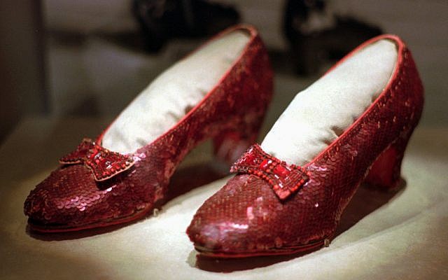 This April 10, 1996, file photo shows one of the four pairs of ruby slippers worn by Judy Garland in the 1939 film 'The Wizard of Oz' on display during a media tour of the 'America's Smithsonian' traveling exhibition in Kansas City, Missouri (AP Photo/Ed Zurga, File) This April 10, 1996, file photo shows one of the four pairs of ruby slippers worn by Judy Garland in the 1939 film 'The Wizard of Oz' on display during a media tour of the 'America's Smithsonian' traveling exhibition in Kansas City, Missouri (AP Photo/Ed Zurga, File)