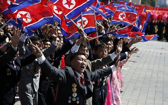 Participants cheer as they take part in a parade marking the 70th anniversary of North Korea's founding day in Pyongyang, North Korea, Sunday, Sept. 9, 2018. (AP Photo/Ng Han Guan) Participants cheer as they take part in a parade marking the 70th anniversary of North Korea's founding day in Pyongyang, North Korea, Sunday, Sept. 9, 2018. (AP Photo/Ng Han Guan)