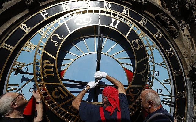Workers adjust repaired parts of the famed astronomical clock at the Old Town Hall in Prague, Czech Republic, September 11, 2018. (AP Photo/Petr David Josek) Workers adjust repaired parts of the famed astronomical clock at the Old Town Hall in Prague, Czech Republic, September 11, 2018. (AP Photo/Petr David Josek)