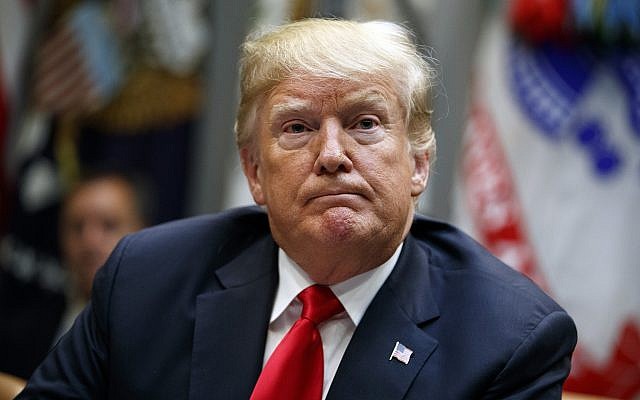 President Donald Trump listens to a question from a reporter during a meeting of the President's National Council of the American Worker in the Roosevelt Room of the White House, Sept. 17, 2018, in Washington. (AP Photo/Evan Vucci) President Donald Trump listens to a question from a reporter during a meeting of the President's National Council of the American Worker in the Roosevelt Room of the White House, Sept. 17, 2018, in Washington. (AP Photo/Evan Vucci)