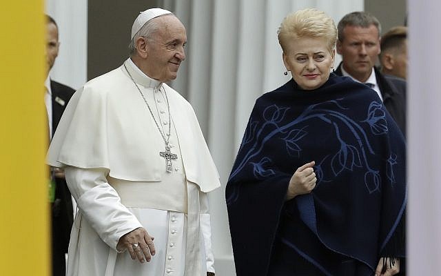 Pope Francis smiles as he arrives with Lithuanian President Dalia Grybauskaite, right, ahead of a meeting with authorities, civil society and diplomatic corps in the square in front of the Presidential Palace, in Vilnius, Lithuania, Sept. 22, 2018 (AP Photo/Andrew Medichini) Pope Francis smiles as he arrives with Lithuanian President Dalia Grybauskaite, right, ahead of a meeting with authorities, civil society and diplomatic corps in the square in front of the Presidential Palace, in Vilnius, Lithuania, Sept. 22, 2018 (AP Photo/Andrew Medichini)