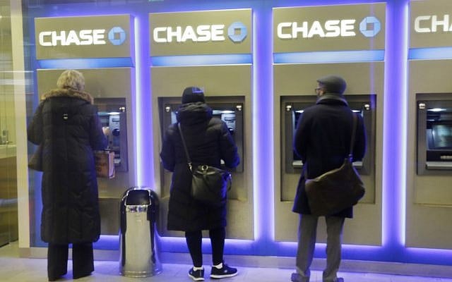 Customers using ATM machines at a branch of Chase Bank in New York, January 14, 2015. (AP/Mark Lennihan) Customers using ATM machines at a branch of Chase Bank in New York, January 14, 2015. (AP/Mark Lennihan)