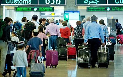 Illustrative image of travelers seen at the arrival hall of Ben Gurion International Airport, near Tel Aviv, on April 11, 2018. (Moshe Shai/FLASH90)