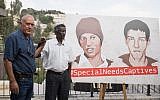 The brother of Avera Mengistu (r) and father of Hisham al-Sayad pose for a picture as they hold a press conference calling for the release of the two Israeli citizens from Hamas captivity, on September 6, 2018. (Hadas Parush/FLASH90)