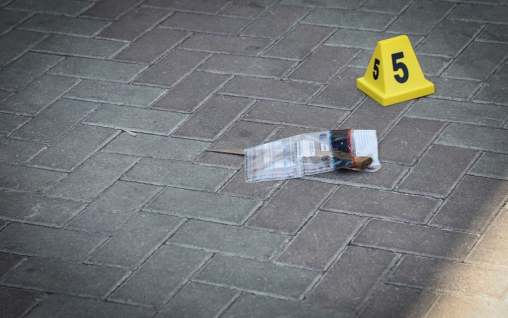 A knife used by a Palestinian teenager in a deadly terror stabbing is seen at the scene of the attack, next to the Gush Etzion Junction, on September 16, 2018. (Gershon Elinson/Flash90) A knife used by a Palestinian teenager in a deadly terror stabbing is seen at the scene of the attack, next to the Gush Etzion Junction, on September 16, 2018. (Gershon Elinson/Flash90)