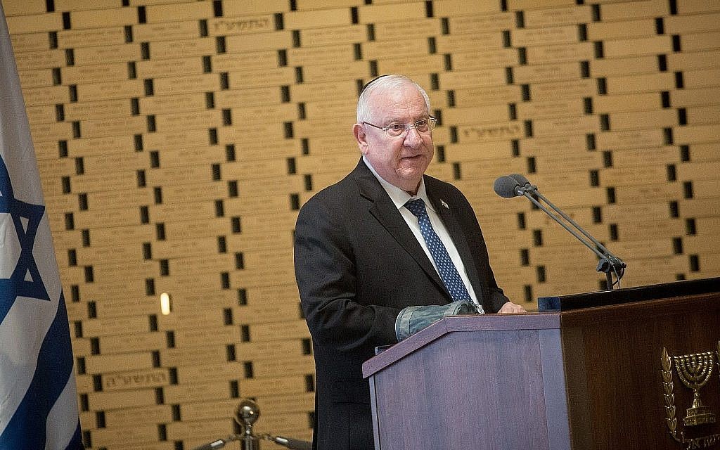President Reuven Rivlin speaks at a ceremony to mark the Yom Kippur War at Jerusalem's Mount Herzl military cemetery on September 20, 2018. (Miriam Alster/Flash90)