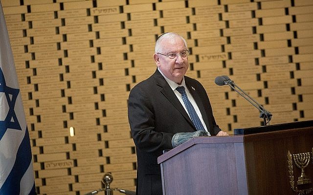 President Reuven Rivlin speaks at a ceremony to mark the Yom Kippur War at Jerusalem's Mount Herzl military cemetery on September 20, 2018. (Miriam Alster/Flash90)