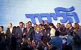 Prime Minister Benjamin Netanyahu, his wife Sara and Likud parliament members at the Likud party toast ahead of the Jewish neew year holiday, in Tel Aviv on September 6, 2018. (Aharon Krohn/Flash90)