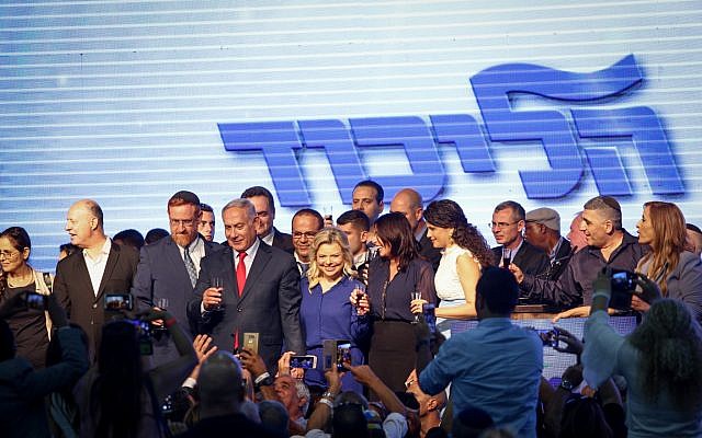 Prime Minister Benjamin Netanyahu, his wife Sara and Likud parliament members at the Likud party toast ahead of the Jewish neew year holiday, in Tel Aviv on September 6, 2018. (Aharon Krohn/Flash90) Prime Minister Benjamin Netanyahu, his wife Sara and Likud parliament members at the Likud party toast ahead of the Jewish neew year holiday, in Tel Aviv on September 6, 2018. (Aharon Krohn/Flash90)