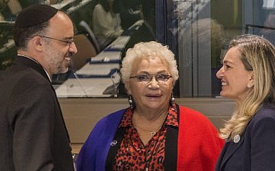 From left to right: Rabbi Gadi Piperno, Clelia Piperno and Italian United Nations Ambassador Mariangela Zappia talk at an event at the United Nations celebrating the ongoing translation of the Talmud into Italian, Sept. 28. (Courtesy Mustando Communications)