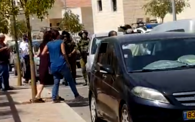 Security forces search the Tekoa settlement after a Palestinian man attempted to attack an Israeli man nearby on September 2, 2018. (Screen capture)