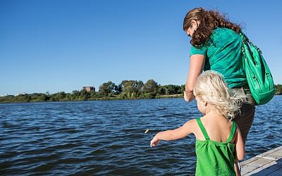 2015 was the last year that Temple B'nai Brith families were allowed to use bread at the traditional tashlich ceremony at the Blessing of the Bay Boathouse in Somerville, Massachusetts. (Sharona Jacobs/ via JTA)