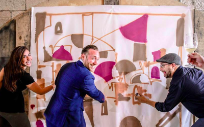 Members of The Israel Innovation Fund, creating original works of art with the help of artist-in-residence, Solomon Souza (Courtesy TIIF)