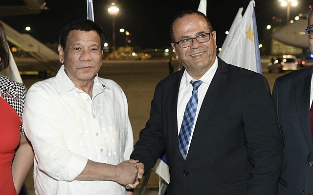 Philippines President Rodrigo Duterte with Communications Minister Ayoub Kara at Ben Gurion Airport. September 2, 2018 (Avi Ohayon/Government Press Office) Philippines President Rodrigo Duterte with Communications Minister Ayoub Kara at Ben Gurion Airport. September 2, 2018 (Avi Ohayon/Government Press Office)