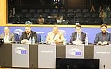 Mark Meechan (second from left), who taught a dog to give a Nazi salute, speaks at a UKIP conference in the European Parliament. (Screen capture: YouTube)
