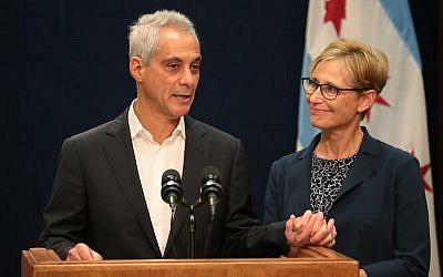 With wife Amy Rule by his side, Chicago Mayor Rahm Emanuel announces Tuesday, September 4, 2018 he will not seek a third term in office at a press conference on the 5th floor at City Hall in Chicago. (Stacey Wescott/Chicago Tribune/TNS via Getty Images/via JTA)