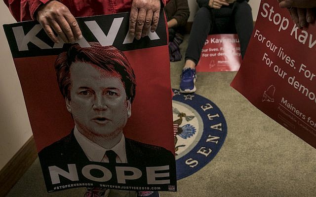 Illustrative: Women participate in a sit-in in Sen. Susan Collins’ office in Portland, Maine, to urge her to vote no on the confirmation of Supreme Court nominee Brett Kavanaugh, on September 28, 2018. (Sarah Rice/Getty Images via JTA) Illustrative: Women participate in a sit-in in Sen. Susan Collins’ office in Portland, Maine, to urge her to vote no on the confirmation of Supreme Court nominee Brett Kavanaugh, on September 28, 2018. (Sarah Rice/Getty Images via JTA)