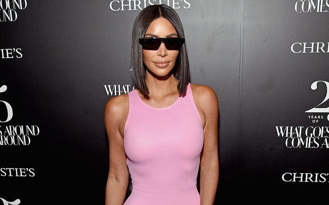 Kim Kardashian at a Christie’s auction preview in Beverly Hills, Calif., Aug. 21, 2018. (Michael Kovac/Getty Images for What Goes Around Comes Around)