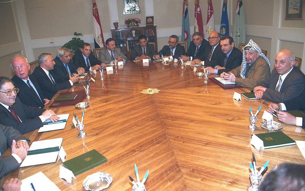 Prime minister Yitzhak Rabin and the Israeli
Delegation meeting in Cairo with PLO chairman Yasser Arafat and
the Palestinian Delegation in 1993.
(Tzvika Israeli / Israel GPO / Courtesy of HBO)