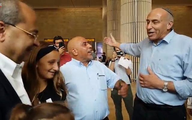 Jewish Home MK Moti Yogev (r) remonstrates with Joint (Arab) List MKs at Ben Gurion airport on September 3, 2018. (Screen capture: Ynet news) Jewish Home MK Moti Yogev (r) remonstrates with Joint (Arab) List MKs at Ben Gurion airport on September 3, 2018. (Screen capture: Ynet news)