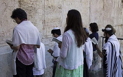 Conservative Jews praying at Robinson’s Arch in Jerusalem, July 30, 2014. (Robert Swift/ Flash90/ via JTA/ File)