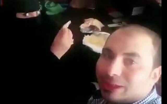 Saudi authorities arrested an Egyptian hotel worker who appeared in what officials described as an 'offensive' video eating breakfast with a female co-worker (Twitter Screenshot)