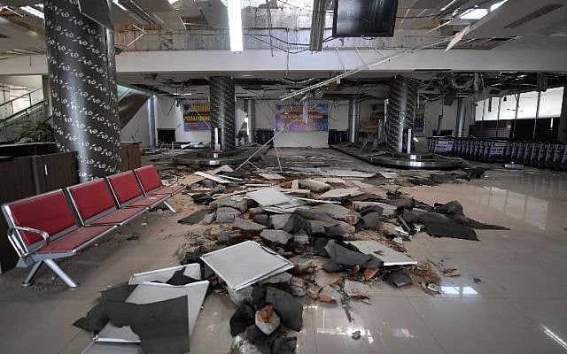 Damage to the Mutiara Sis Al Jufri airport is seen in Palu, in Indonesia's Central Sulawesi province, on September 30, 2018, following the deadly September 28 earthquake and tsunami. (AFP Photo/Adek Berry) Damage to the Mutiara Sis Al Jufri airport is seen in Palu, in Indonesia's Central Sulawesi province, on September 30, 2018, following the deadly September 28 earthquake and tsunami. (AFP Photo/Adek Berry)