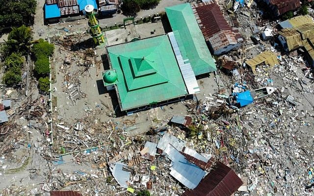 The devastation after tsunami waves swept through coastal houses and buildings in Wani, Indonesia's Central Sulawesi, seen in a aerial photograph taken on October 3, 2018. (JEWEL SAMAD/AFP) The devastation after tsunami waves swept through coastal houses and buildings in Wani, Indonesia's Central Sulawesi, seen in a aerial photograph taken on October 3, 2018. (JEWEL SAMAD/AFP)