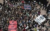 Protesters occupy the Senate Hart building during a rally against Supreme Court nominee Brett Kavanaugh on Capitol Hill in Washington, DC on October 4, 2018. (AFP / ANDREW CABALLERO-REYNOLDS)