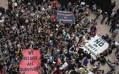 Protesters occupy the Senate Hart building during a rally against Supreme Court nominee Brett Kavanaugh on Capitol Hill in Washington, DC on October 4, 2018. (AFP / ANDREW CABALLERO-REYNOLDS)