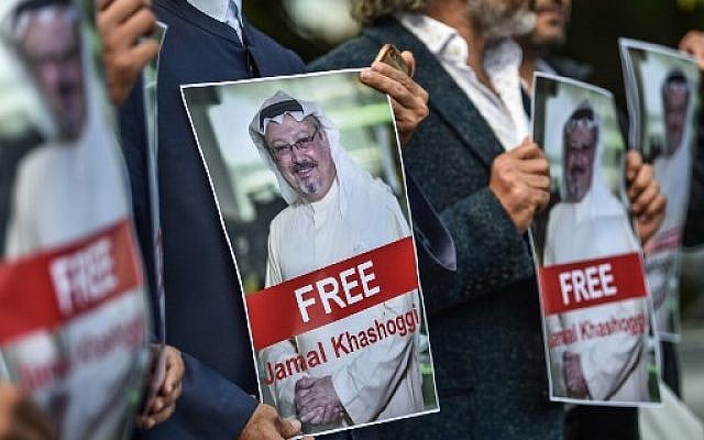 Protestors hold pictures of missing journalist Jamal Khashoggi during a demonstration in front of the Saudi Arabian consulate in Istanbul on October 5, 2018. (AFP/ OZAN KOSE) Protestors hold pictures of missing journalist Jamal Khashoggi during a demonstration in front of the Saudi Arabian consulate in Istanbul on October 5, 2018. (AFP/ OZAN KOSE)