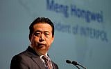 In this photo taken on July 4, 2017, Meng Hongwei, president of Interpol, gives an address at the opening of the Interpol World Congress in Singapore. (AFP Photo/Roslan Rahman)