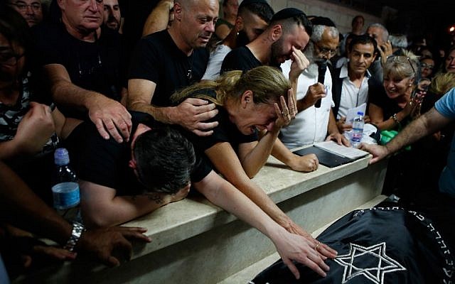 Mother Hava and relatives and friends mourn during the funeral of Kim Levengrond Yehezkel, aged 28, one of the two Israelis killed earlier in a terrorist attack, on October 7, 2018, in Rosh Haayin. (AFP PHOTO / Gil COHEN-MAGEN) Mother Hava and relatives and friends mourn during the funeral of Kim Levengrond Yehezkel, aged 28, one of the two Israelis killed earlier in a terrorist attack, on October 7, 2018, in Rosh Haayin. (AFP PHOTO / Gil COHEN-MAGEN)