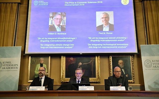 (L-R) Per Stroemberg, Goeran K Hansson and Per Krusell announce the laureates of the Nobel Prize in Economics during a press conference at The Royal Swedish Academy of Sciences in Stockholm on October 8, 2018. (AFP Photo/TT News Agency/Henrik Montgomery) (L-R) Per Stroemberg, Goeran K Hansson and Per Krusell announce the laureates of the Nobel Prize in Economics during a press conference at The Royal Swedish Academy of Sciences in Stockholm on October 8, 2018. (AFP Photo/TT News Agency/Henrik Montgomery)