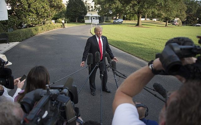 US President Donald Trump speaks as he arrives at the White House in Washington, DC, on October 8, 2018. (AFP/ Jim WATSON) US President Donald Trump speaks as he arrives at the White House in Washington, DC, on October 8, 2018. (AFP/ Jim WATSON)