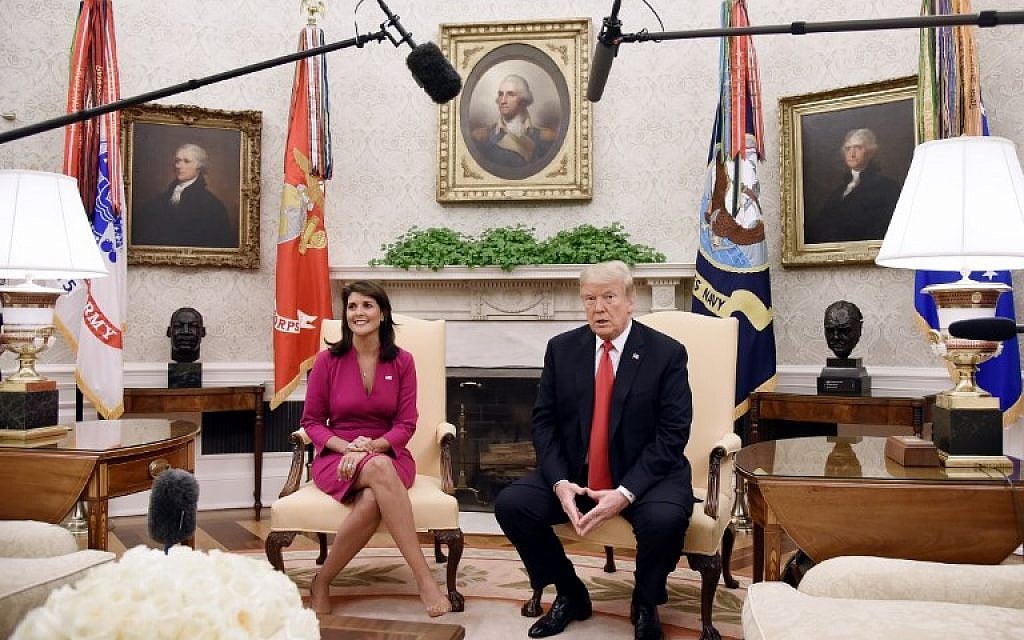 US President Donald Trump meets with Nikki Haley, the United States Ambassador to the United Nations in the Oval office of the White House on October 9, 2018 in Washington, DC. (AFP PHOTO / Olivier Douliery)