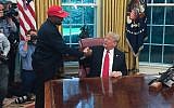 Then-US president Donald Trump meets with rapper Kanye West in the Oval Office of the White House in Washington, DC, October 11, 2018. (SEBASTIAN SMITH/AFP)