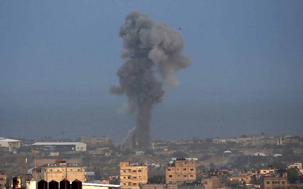 Smoke billows following an Israeli airstrike in the southern Gaza Strip city of Rafah on October 17, 2018. (Said Khatib/AFP)