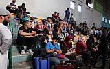 Illustrative: Palestinians wait to travel to Egypt through the Rafah border crossing in the southern Gaza Strip, on September 26, 2018. (Said Khatib/AFP)