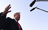 US President Donald Trump speaks with reporters before departing for a rally on October 27, 2018 in Murphysboro, Illinois. (Nicholas Kamm / AFP)